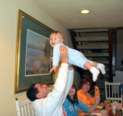 HolidayPaulCJ.jpg - CJ loves being hurled into the air.
