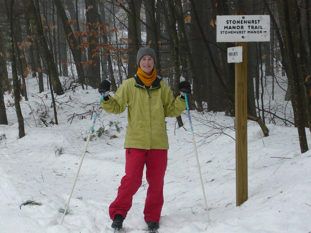 JoyceSki.JPG - Joyce skiing in the Whitaker woods.